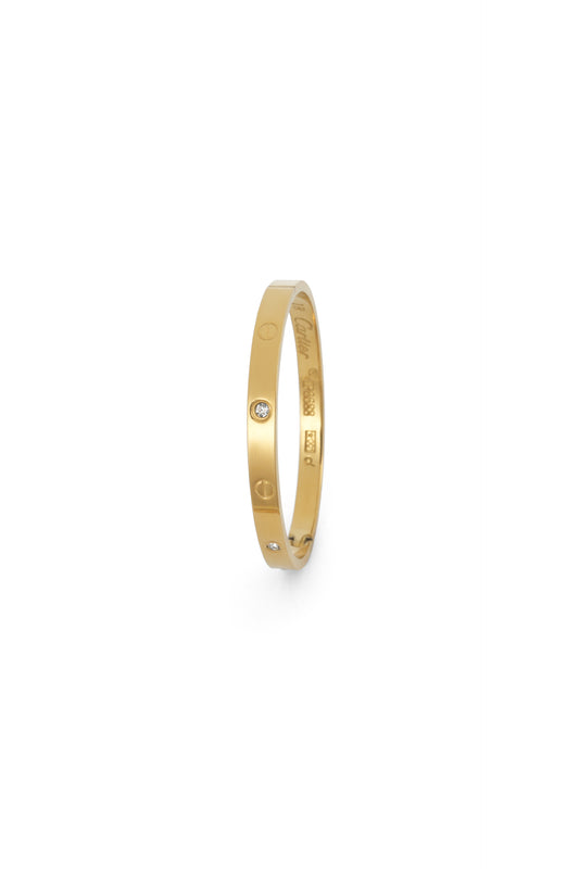 Classic Gold Bangle Bracelet with Diamond Accents - Timeless Elegance