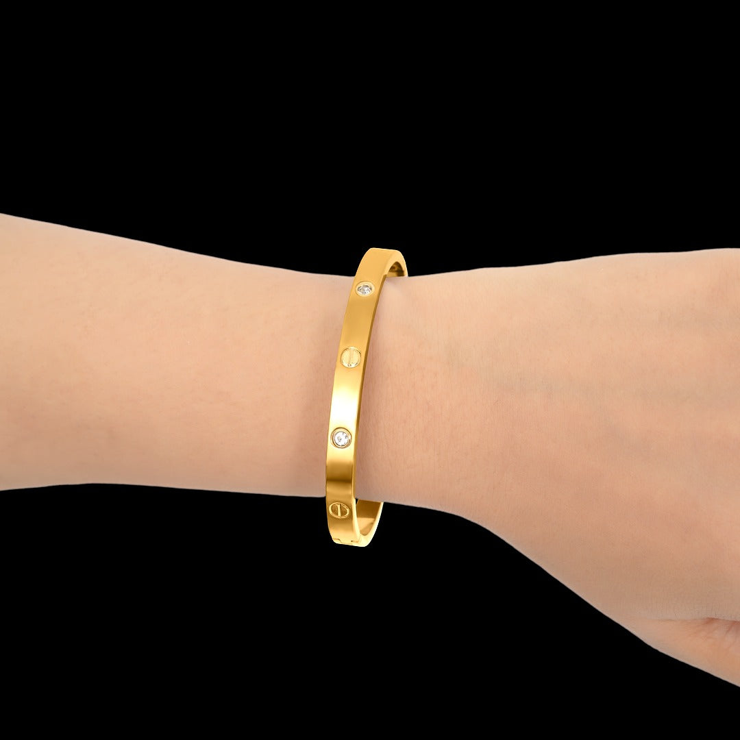 Classic Gold Bangle Bracelet with Diamond Accents - Timeless Elegance