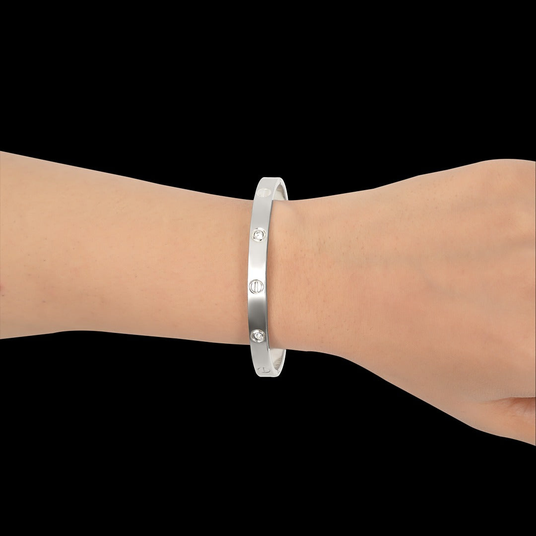 Elegant Silver Bangle Bracelet with Diamond Accents - Timeless Luxury